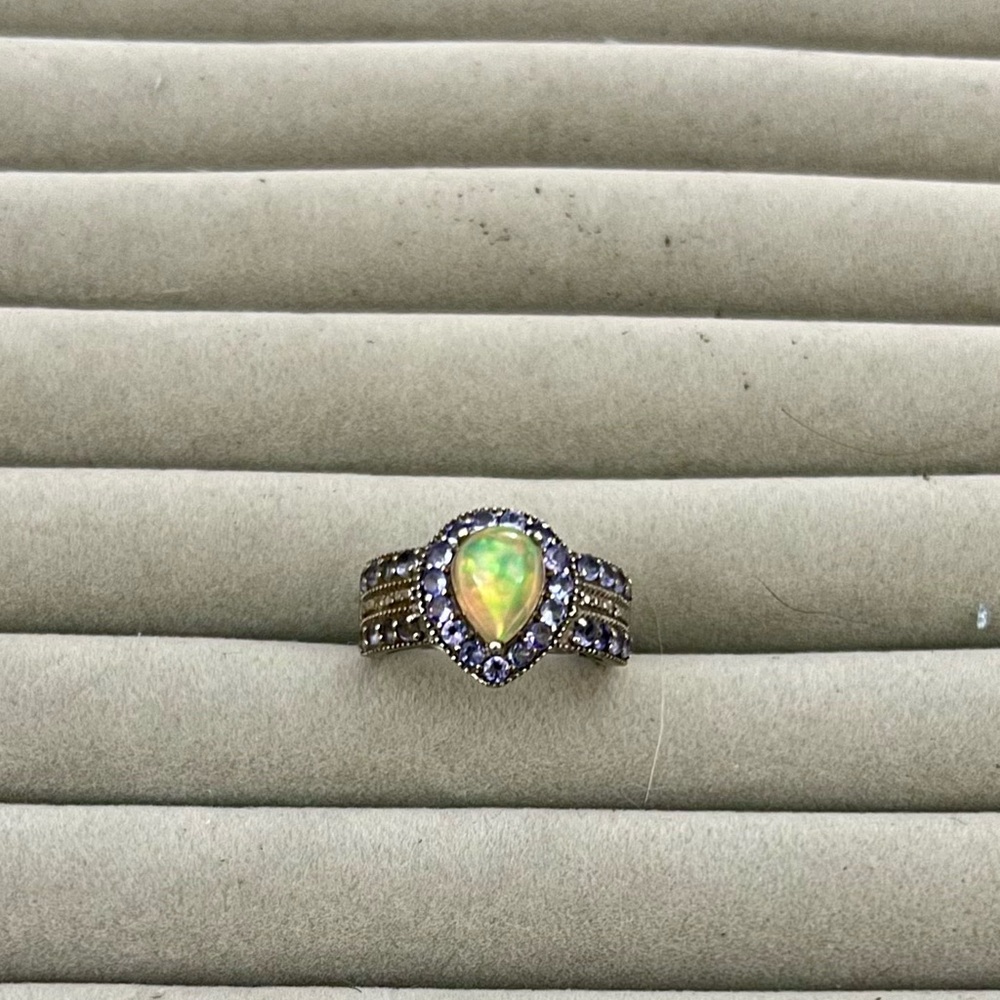 Elegant Opal and Diamond Ring